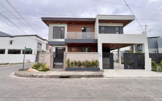 Iconic3-BedroomHouseandLotforSaleinGreenwoodsExecutiveVillageTaytayRizal-1.jpg