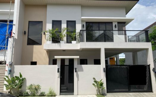 Captivating3-BedroomHouseandLotforSaleinGreenwoodsExecutiveVillageCaintaRizal-1.jpg